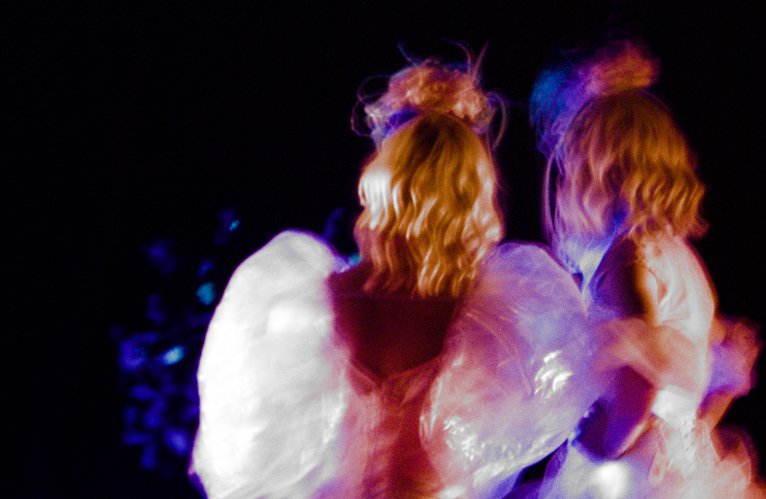 2025 — Two performers in translucent costumes
